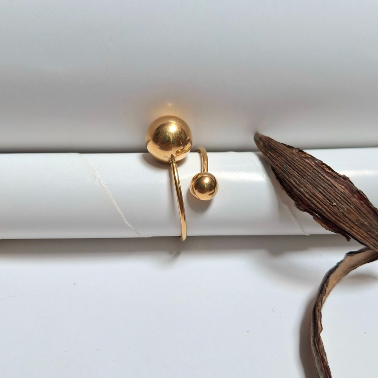 Ball hoop ring with sleek modern styling