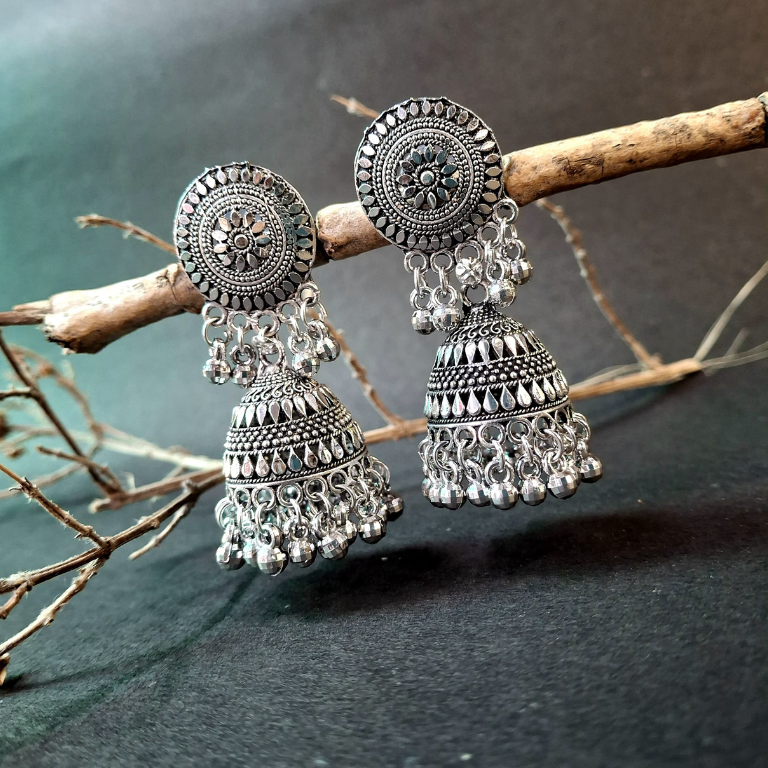 Festive silver tone jhumka earrings perfect for traditional occasions