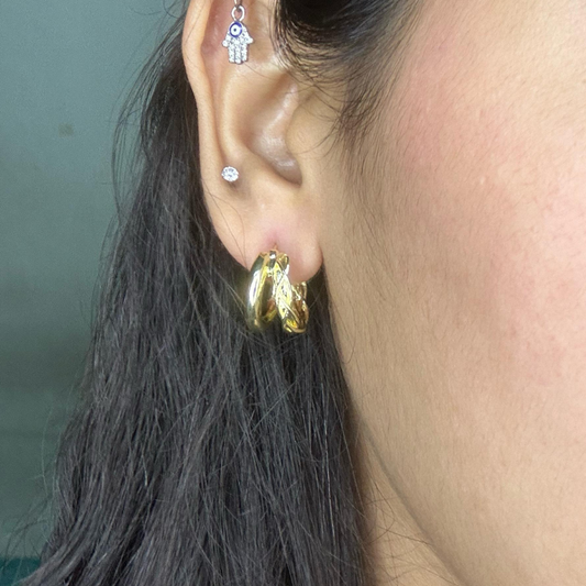 Minimalist gold double hoop earrings for versatile fashion