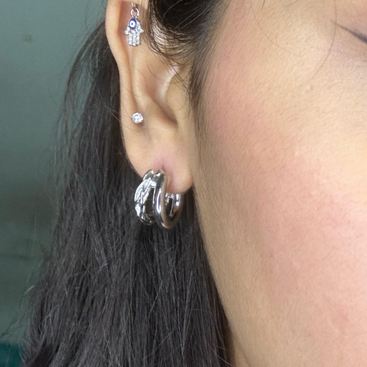 Silver double hoop earrings with a clean and modern style