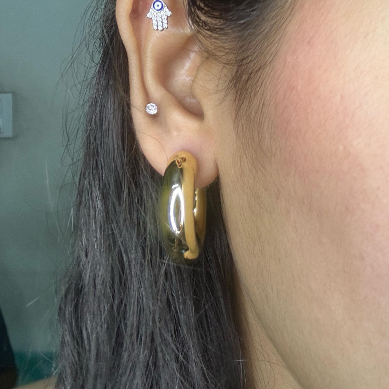 Hollow round hoop earrings with stud detailing