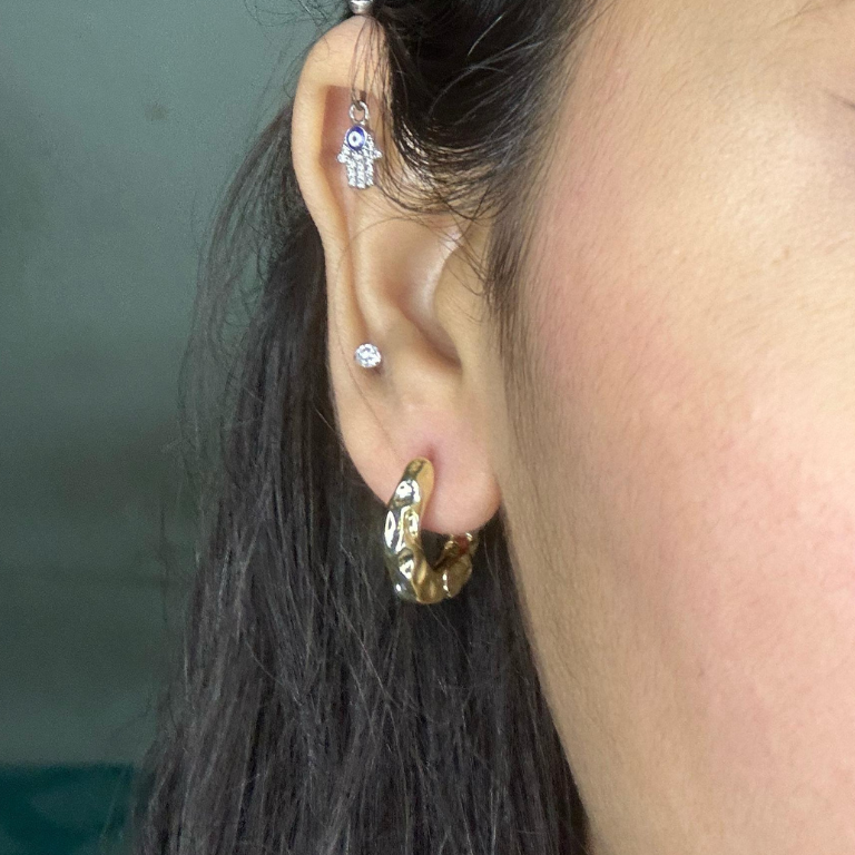 Textured gold pleated earrings for a minimalist elegant look