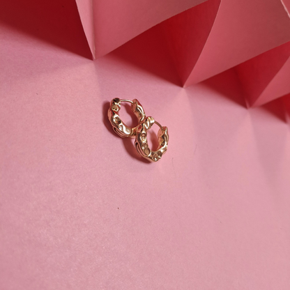 Textured gold pleated earrings for a minimalist elegant look
