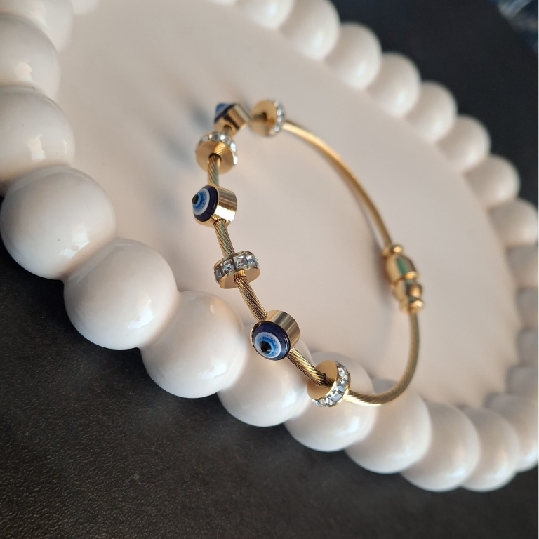 Stainless steel evil eye bracelet with minimalist design