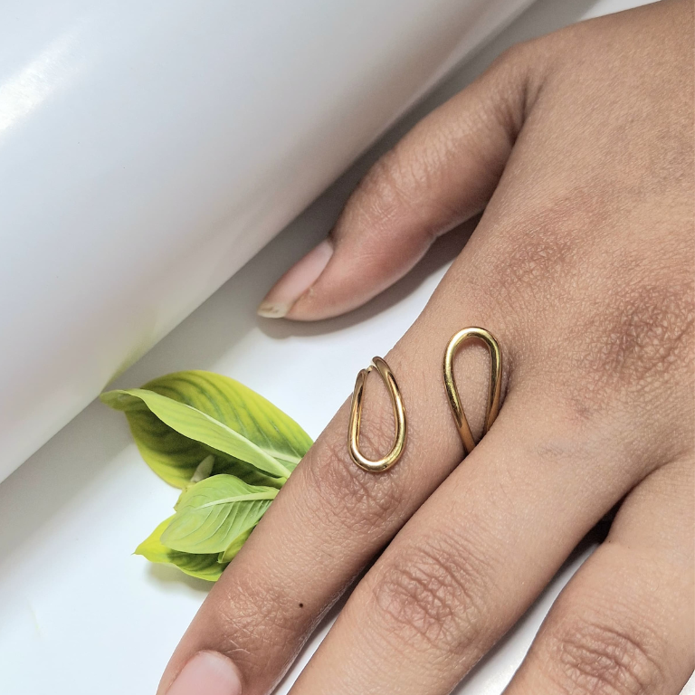 Hollow drop shaped ring with clean, simple design