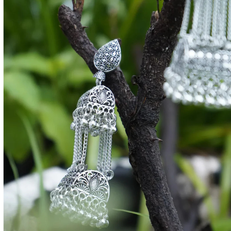 Long chain oxidised jhumka earrings with a statement ethnic style