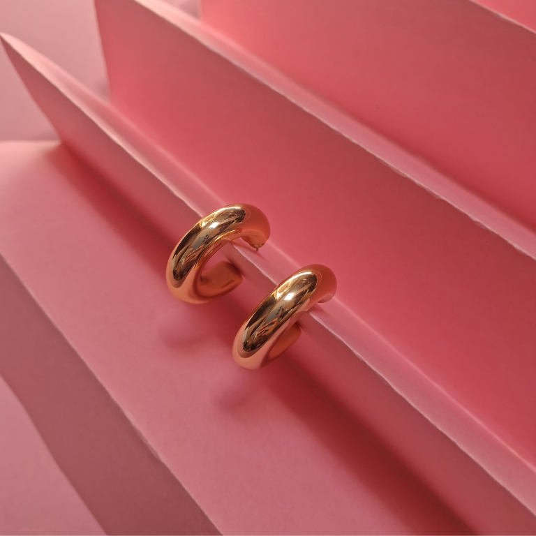 Hollow round hoop earrings with stud detailing