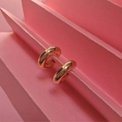 Hollow round hoop earrings with stud detailing