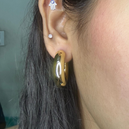 Hollow round hoop earrings with stud detailing